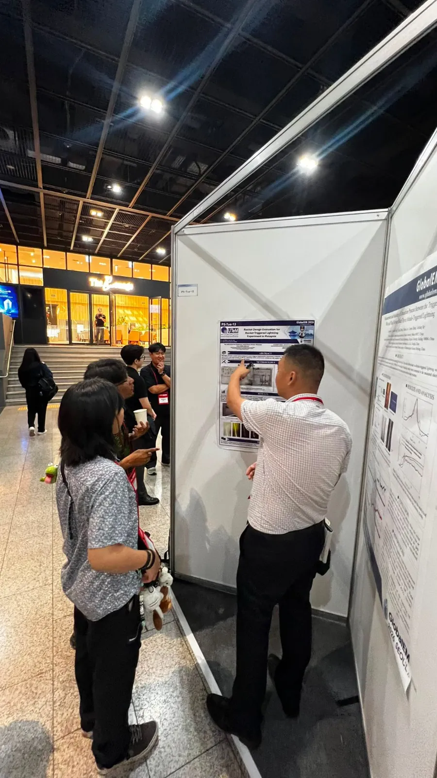 Our rocket design poster being discussed at GlobalEM 2026 in Seoul