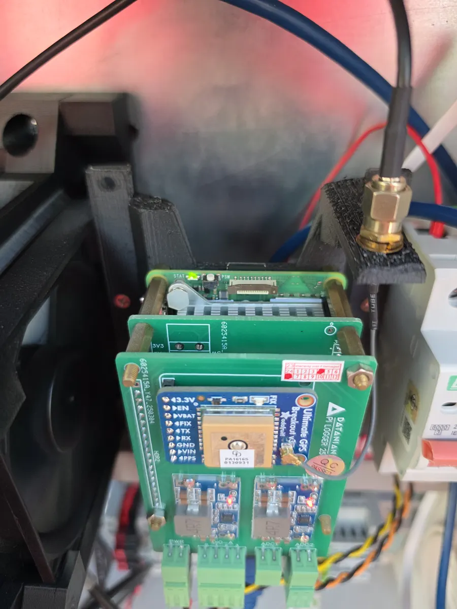 Stacked circuit boards with a GPS module inside a sensor enclosure
